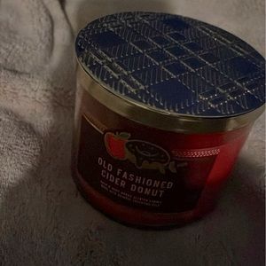 Bath and body works 3 wick candle in Old Fashioned Cider Donut.